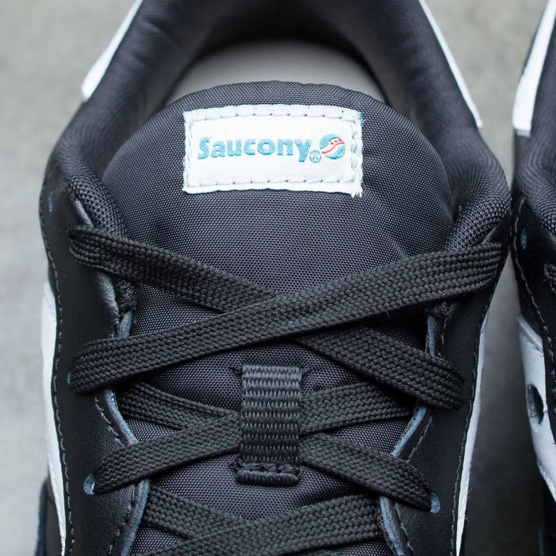 Saucony Men DXN Trainer (black / white)