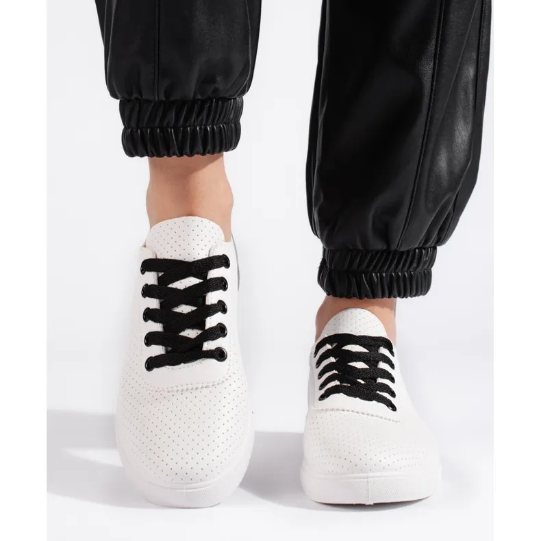 Women's white and black openwork sneakers