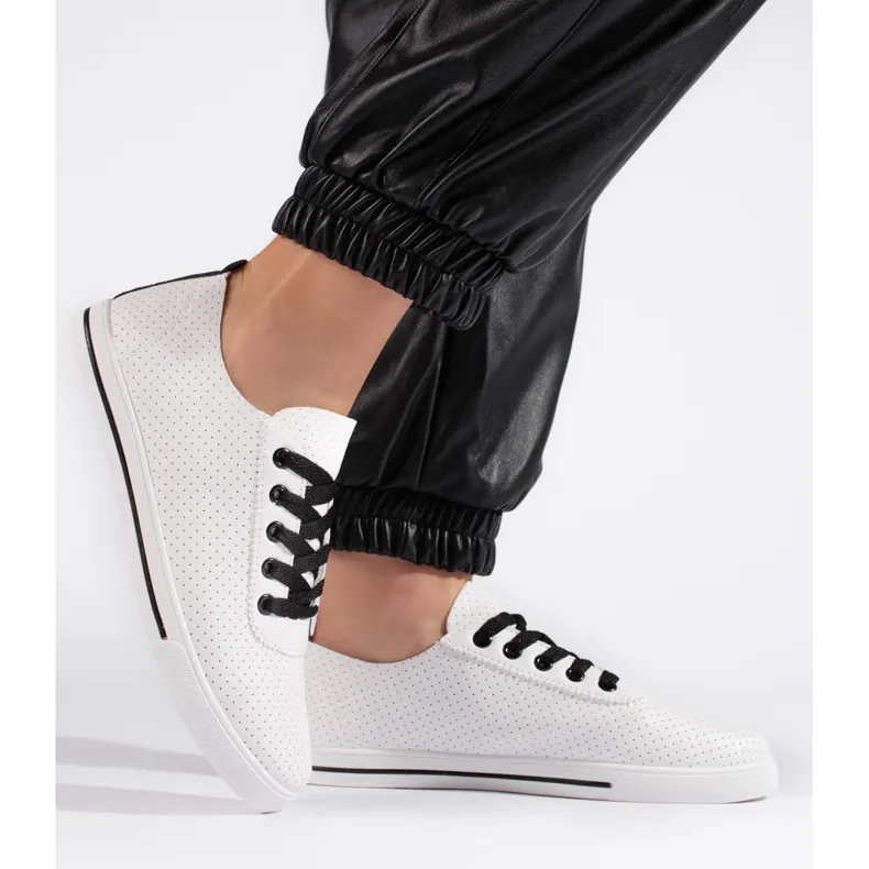 Women's white and black openwork sneakers