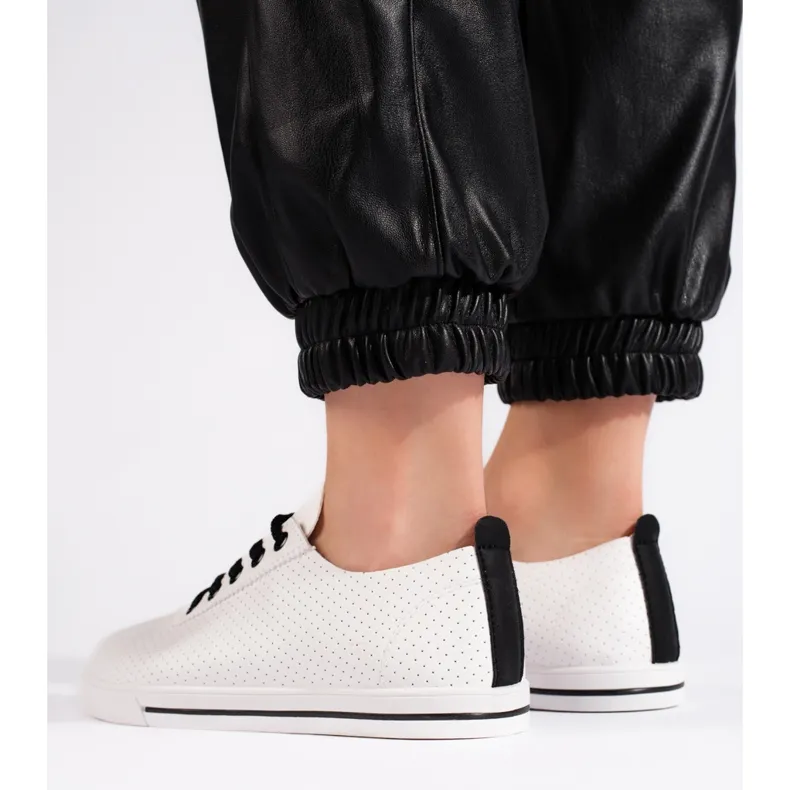 Women's white and black openwork sneakers